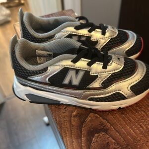 New Balance Kids' Black and Silver Sneakers